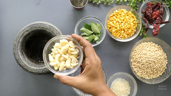 homemade-garlic-idli-podi-step-1-crushing-garlic