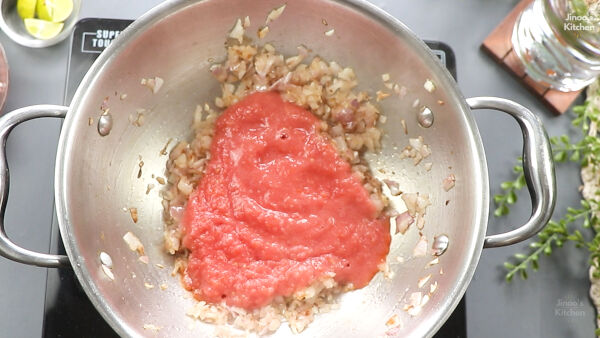 adding tomaotes paneer-pav-bhaji