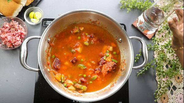 adding water paneer-pav-bhaji